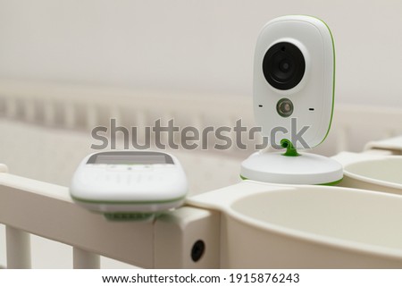 Picture of a baby monitor, camera a in  child room