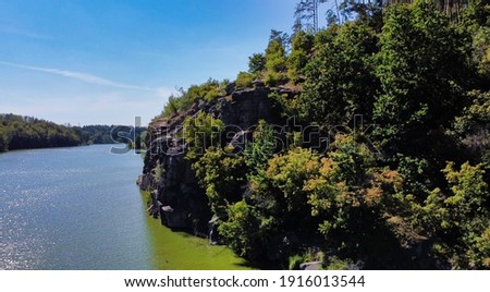 View of the river and trees on the bank in the city of Zhitomir. Teteriv river. View from the top. Zhytomyr. Ukraine. Europe