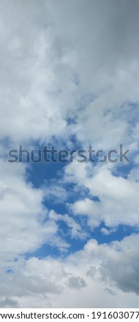 
Large storm clouds against the blue sky