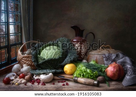 Still life with savoy cabbage  and vegetables