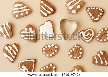 cookies in the form of hearts on a beige background. Top view. Valentine Card
