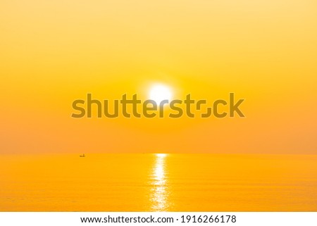 Landscape of sea ocean beach at sunset or sunrise time for leisure travel vacation