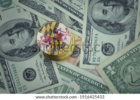 golden shining bitcoins with flag of maryland state on a dollar money background. bitcoin mining concept.
