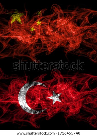China, Chinese vs Turkey, Turkish, Turk smoky mystic flags placed side by side. Thick colored silky abstract smoke flags.