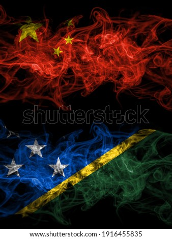 China, Chinese vs Solomon Islands smoky mystic flags placed side by side. Thick colored silky abstract smoke flags.