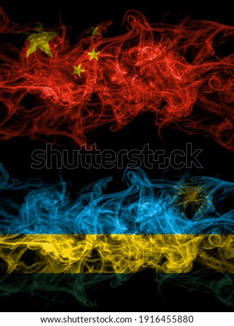 China, Chinese vs Rwanda smoky mystic flags placed side by side. Thick colored silky abstract smoke flags.