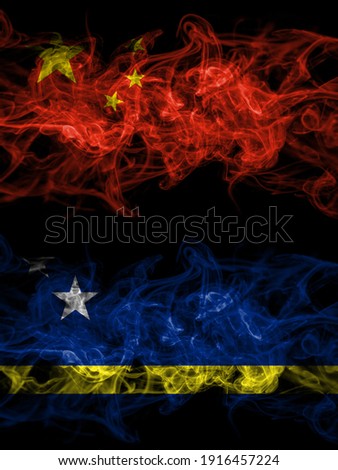 China, Chinese vs Netherlands, Dutch, Holland, Curacao smoky mystic flags placed side by side. Thick colored silky abstract smoke flags.