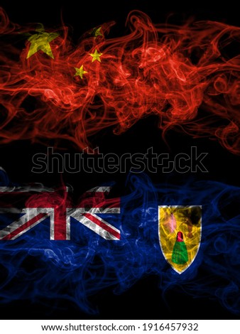 China, Chinese vs British, Britain, Turks and Caicos Islands smoky mystic flags placed side by side. Thick colored silky abstract smoke flags.