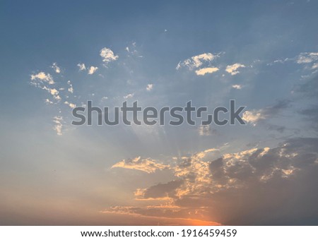 Clouds and the golden evening light of the beautiful sun. no focus