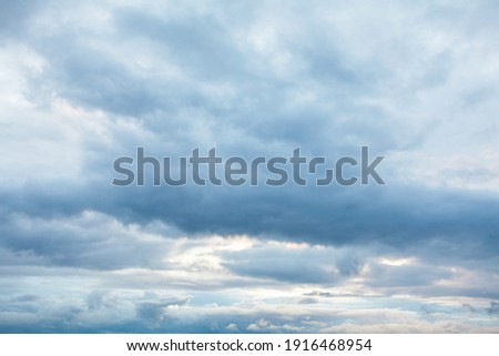 Cloudy sky background . Gloomy weather Royalty-Free Stock Photo #1916468954