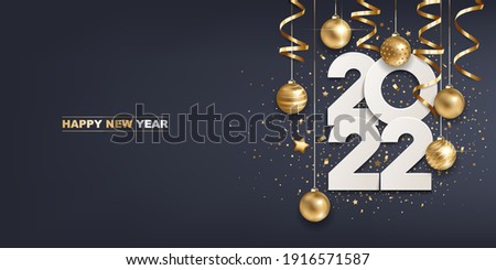Happy new year 2022. White paper numbers with golden Christmas decoration and confetti on  dark blue background. Holiday greeting card design.
 Royalty-Free Stock Photo #1916571587