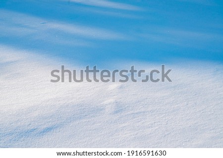 Snow texture with shadow close up