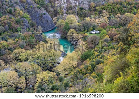 The springs of Voidomatis River at the Vikos Gorge, listed as the deepest gorge in the world by the Guinness Book of Records, in Epirus, Greece Royalty-Free Stock Photo #1916598200