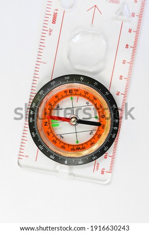 Compass. Magnetic compass on a white background.