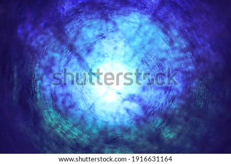Beautiful abstract texture circle in colorful light. Background pattern for design. Macro photography view.