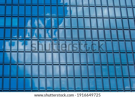 The reflection of the sky in the building glass 