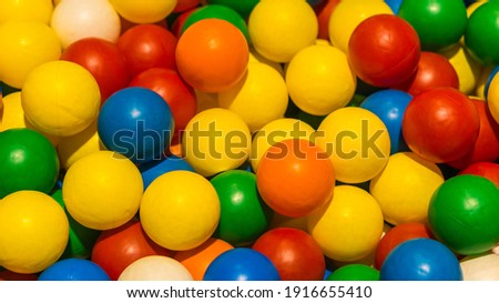 thousands of colored plastic ball in the game pool