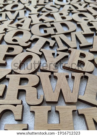 photography with wooden alphabet and letter y in the middle