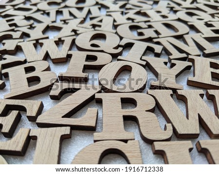wooden letters seen in perspective