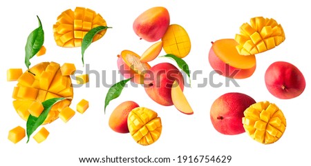 A set with Fresh ripe mango with leaves falling in the air isolated on white background. Food levitation concept. High resolution image Royalty-Free Stock Photo #1916754629