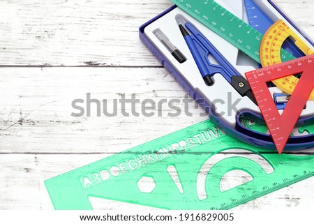 School supplies on a white wooden table 