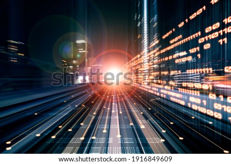 Digital data flow on road with motion blur to create vision of fast speed transfer . Concept of future digital transformation , disruptive innovation and agile business methodology . Royalty-Free Stock Photo #1916849609