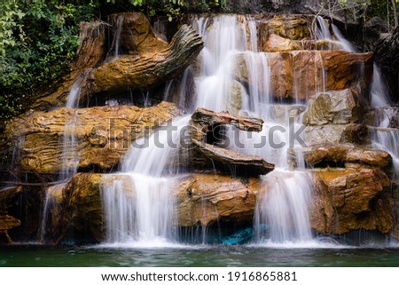 Beautiful waterfall deep in the tropical forest.