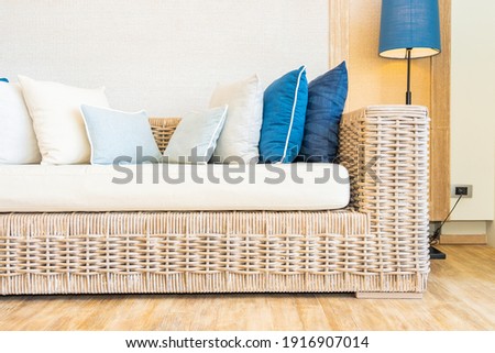 Pillow on sofa with light lamp decoration interior of living room area