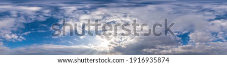 Blue sky with Cumulus clouds Seamless panorama in spherical equirectangular format. Complete zenith for use in 3D graphics, game and for composites in aerial drone 360 degree panoramas as a sky dome.
