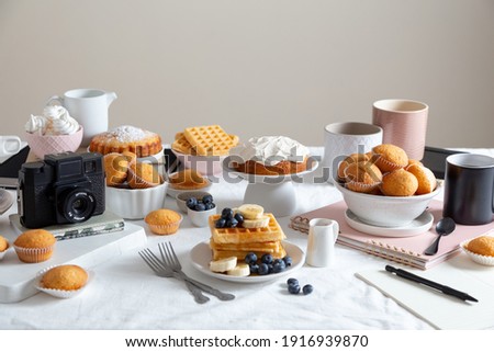 breakfast scene with camera representing food photographers