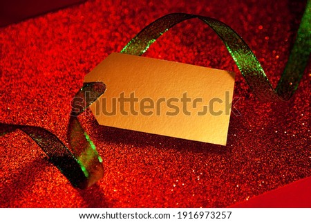 Bright festive background in red, with a golden label.