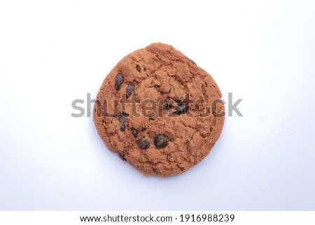 Delicious chocochips cookies on white background. Selective focus, food wallpaper and food background Royalty-Free Stock Photo #1916988239