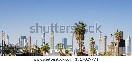 Panorama of modern skyscrapers in the financial district at sunny time. Banner