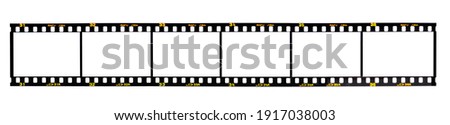 Nostalgic 35mm camera film with space for your images isolated on white background.  Film's fiction brand name Rafu Jira was created by the artist Royalty-Free Stock Photo #1917038003