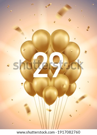 29th Year anniversary celebration background. Golden balloons and confetti with sunbeams in background.
