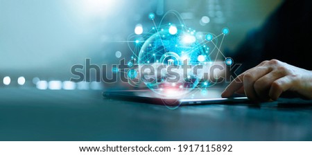 Businessman using tablet online banking and payment, Digital marketing. Finance and banking networking. Online shopping and icon customer network connection, cyber security. Business technology. Royalty-Free Stock Photo #1917115892