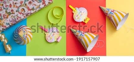 Happy Birthday. The gift Board. Holiday symbols. Colorful bright background. Holiday paraphernalia. Festive box and ribbons.
