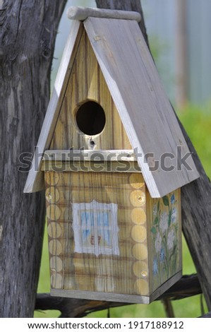 Birdhouse made of wood. A house for birds. High quality photo