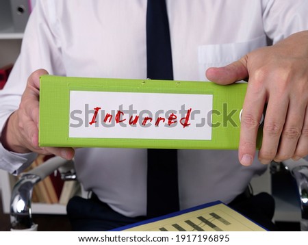 Conceptual photo about Incurred with written text.
 Royalty-Free Stock Photo #1917196895