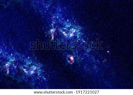 Blue space with stars. Elements of this image were furnished by NASA. High quality photo