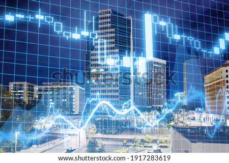 Skyscrapers of business town with trading and financial chart concept.