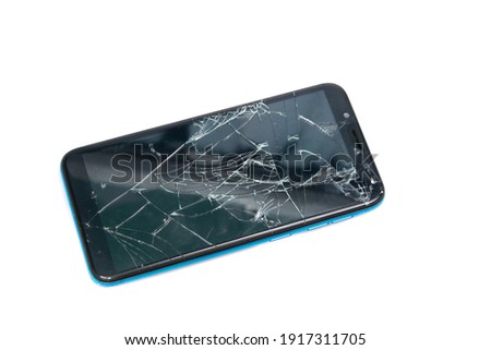 Top view Modern broken mobile phone isolated on white background. Cracked glass on a screen. Copy space for text. Smartphones repair concept