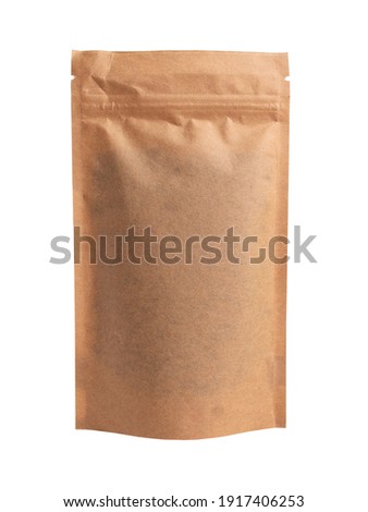 Paper bag with seeds. Isolated on white background. Royalty-Free Stock Photo #1917406253
