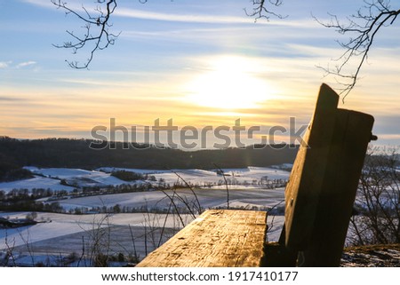 Low sun over snowy landscape