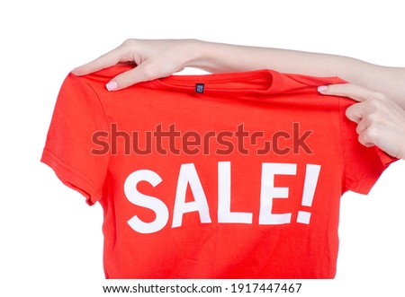 t-shirt sale in hand on white background isolation