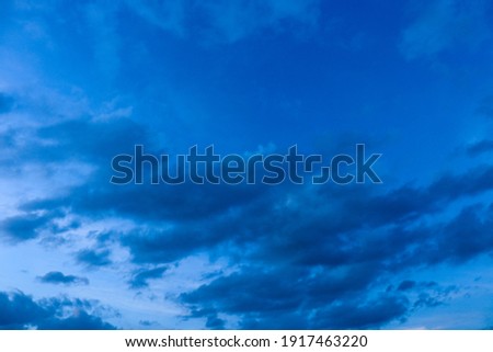 Captured image of a dark sky and clouds.
