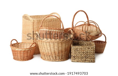 Many different wicker baskets isolated on white Royalty-Free Stock Photo #1917493703