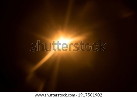Abstract Natural Sun flare on the black Royalty-Free Stock Photo #1917501902