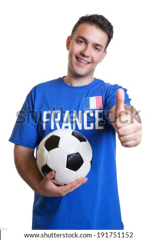 Laughing soccer fan from France with ball showing thumb up