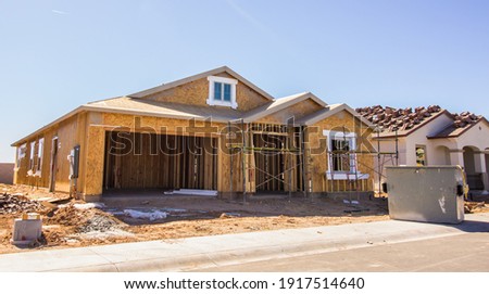 New Home Construction In Housing Development Royalty-Free Stock Photo #1917514640